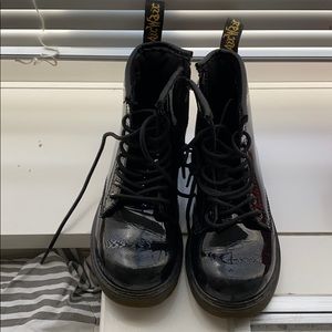 Dr. Martens. 1460 patent leather lace up boot.